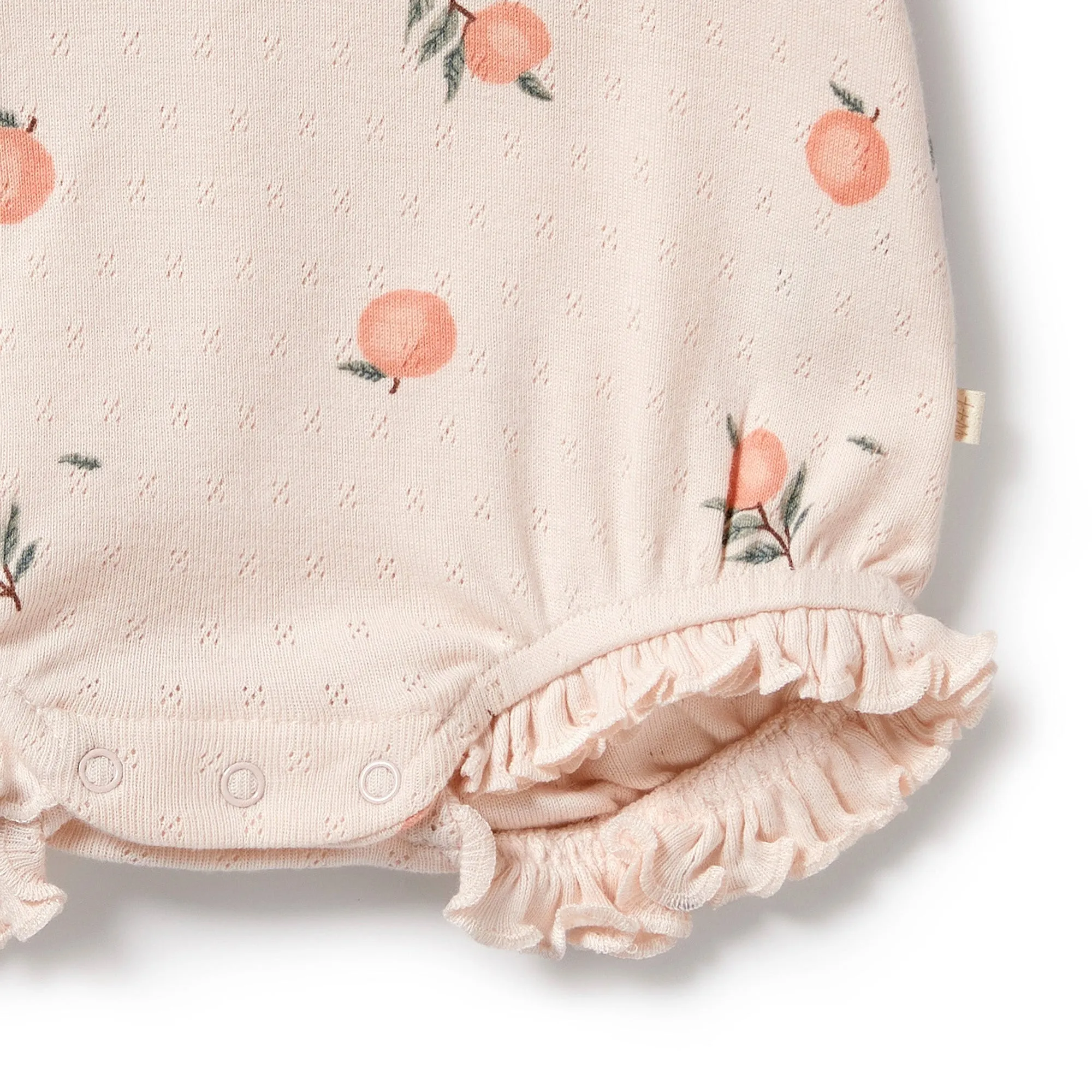 Wilson   Frenchy Organic Pointelle Ruffle Growsuit - Peaches